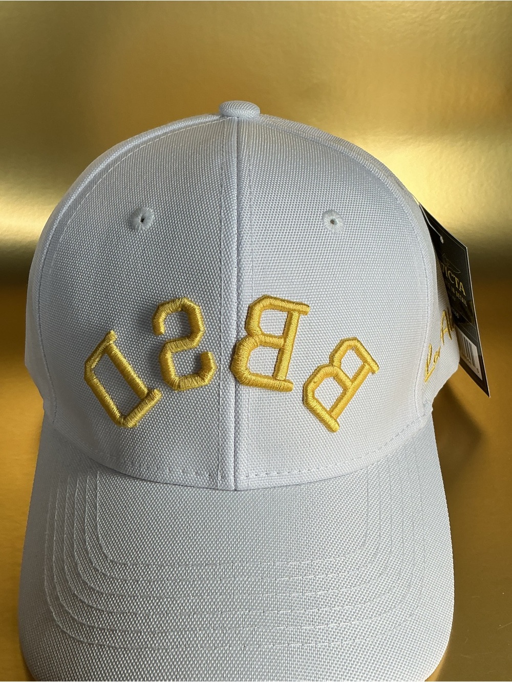 Invicta white Baseball Cap with Yellow Raised backwards Letters BBSD
